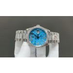 Sunday Calendar series women's watch, turquoise dial, diamond-set bezel, 36mm, diamond-set silver President-style bracelet.